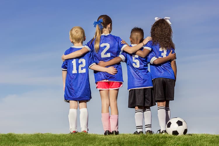 Kids in soccer uniforms