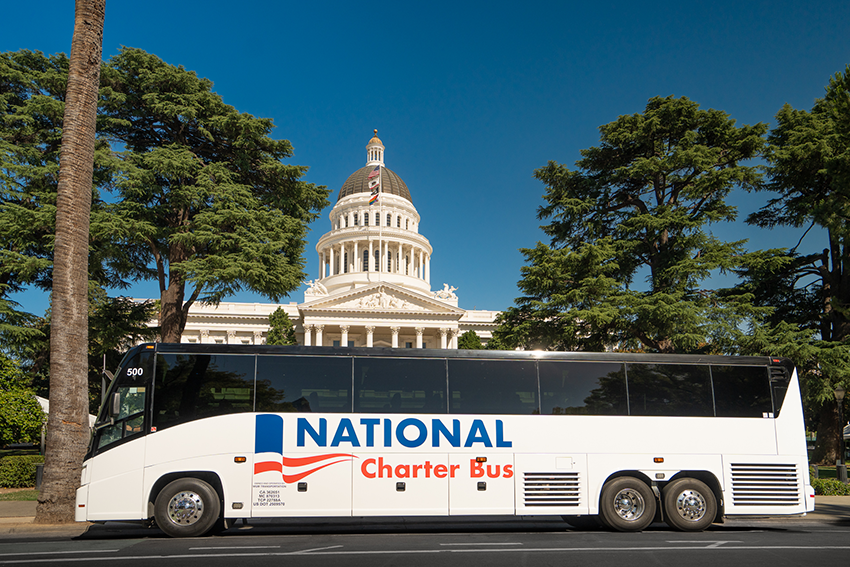 a parked charter bus with National branding