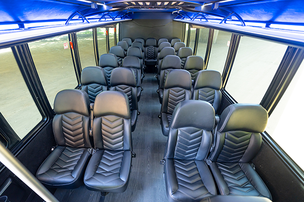 the interior of a charter bus