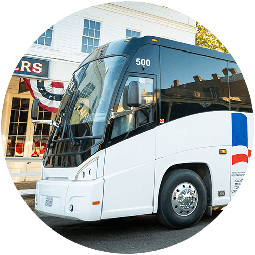 a parked all-white charter bus