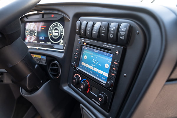 interior driver console on a charter bus