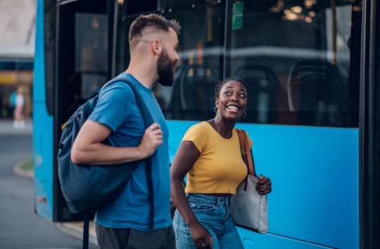 friends board a charter bus